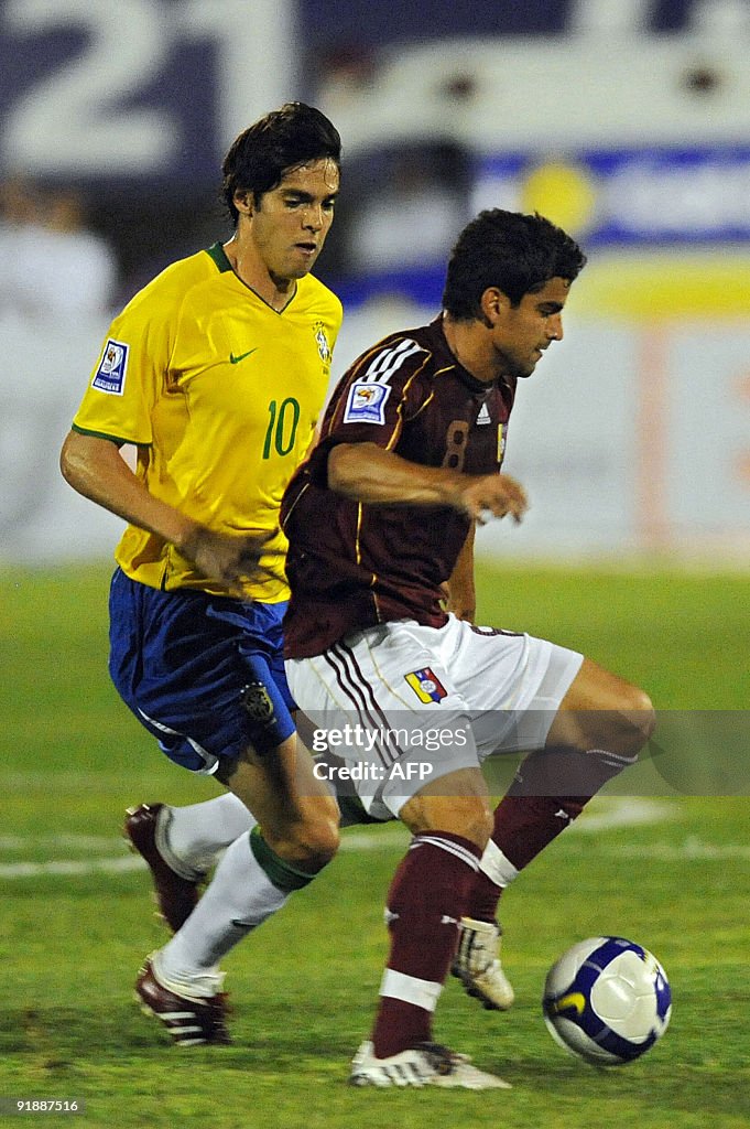 Tomas Ricon Venezulean player Tomas Rincon is marked by Brazilian Kaka during a ...