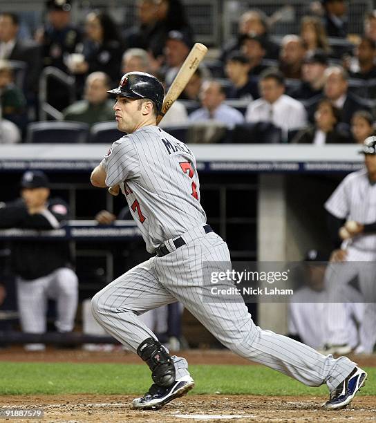 Joe Mauer of the Minnesota Twins at bat against the New York Yankees in Game One of the ALDS during the 2009 MLB Playoffs at Yankee Stadium on...