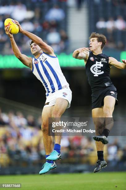 Jarrad Waite of the Kangaroos marks the ball against Caleb Marchbank of the Blues during the AFLX match between Carlton Blues and North Melbourne at...