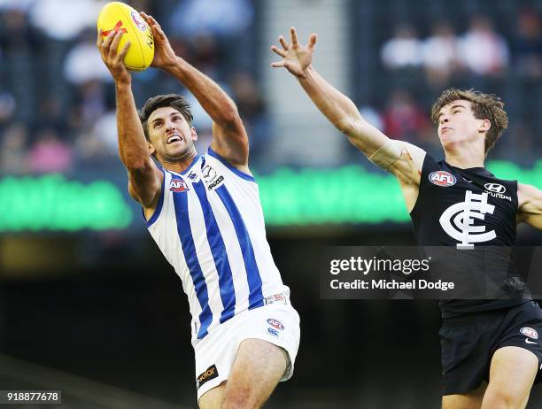 Jarrad Waite of the Kangaroos marks the ball against Caleb Marchbank of the Blues during the AFLX match between Carlton Blues and North Melbourne at...