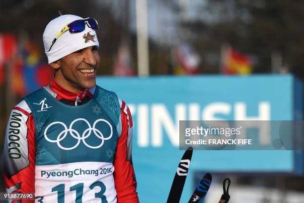 Morocco's Samir Azzimani reacts after finishing in the men's 15km cross country freestyle at the Alpensia cross country ski centre during the...