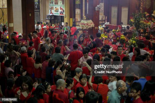 Chinese-Filipinos gather at the buddhist Seng Guan Temple in Manila, Philippines during Chinese New Year celebrations on Friday, February 16, 2018....