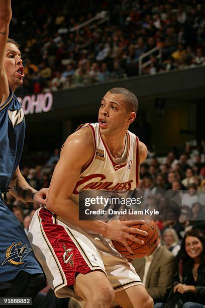 Anthony Parker of the Cleveland Cavaliers looks for an open teammate against the Washington Wizards at The Quicken Loans Arena on October 14, 2009 in...