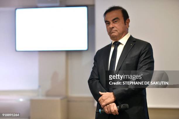 French multinational automobile manufacturer Renault chairman and CEO, Carlos Ghosn stands during a press conference presenting the group's 2017 full...
