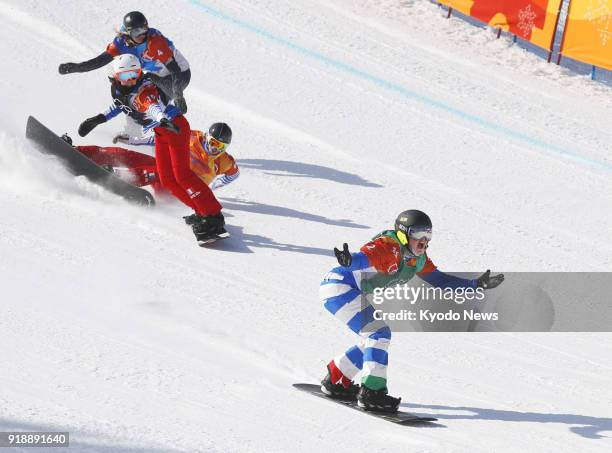 Michela Moioli of Italy races down the slope en route to winning the women's snowboard cross at the Pyeongchang Winter Olympics in South Korea on...