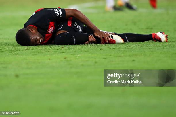 Roly Bonevacia of the Wanderers holds his leg after falling during the round 20 A-League match between the Western Sydney Wanderers and the...