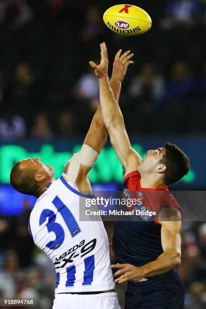 Braydon Preuss of the Kangaroos and Christian Petracca of the Demons compete for the ball during the AFLX match between North Melbourne and Melbourne...