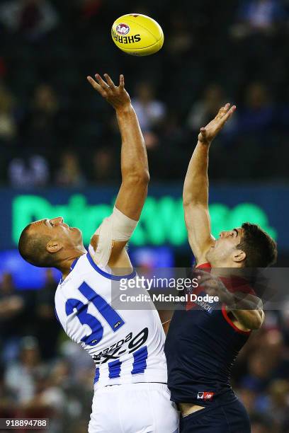 Braydon Preuss of the Kangaroos and Christian Petracca of the Demons compete for the ball during the AFLX match between North Melbourne and Melbourne...