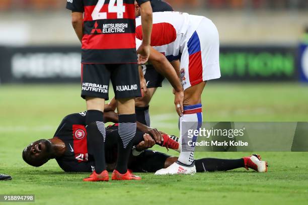 Roly Bonevacia of the Wanderers holds his leg after falling during the round 20 A-League match between the Western Sydney Wanderers and the...
