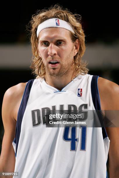 Dirk Nowitzki of the Dallas Mavericks takes a break from the action during the preseason game against the Memphis Grizzlies on October 11, 2009 at...