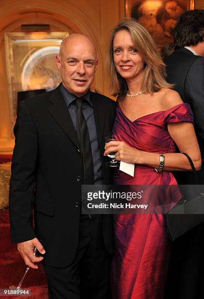 Brian Eno and Sabrina Guinness attend a private dinner for Brioni hosted by Bryan Ferry at Annabel's on October 14, 2009 in London, England.