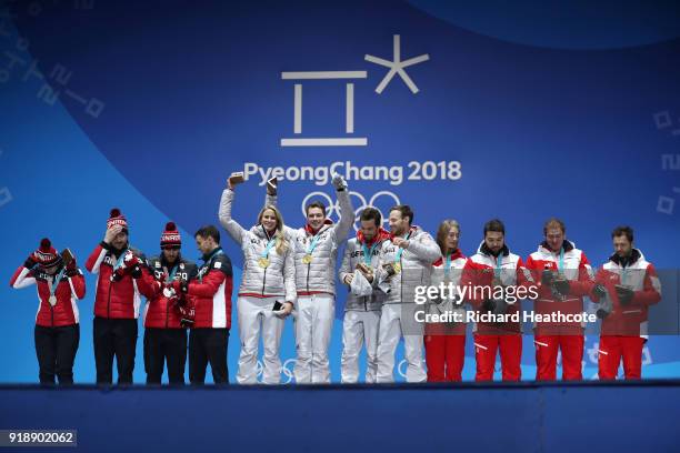 Silver medalists Alex Gough, Samoa Edney, Tristan Walker and Justin Snith of Canada, gold medalists Natalie Geisenberger, Johannes Ludwig, Tobias...