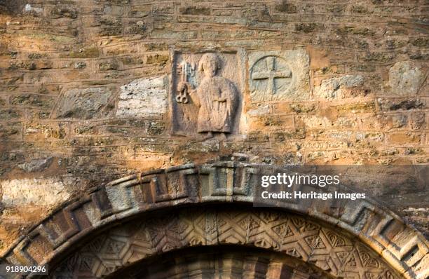 Church of St Peter, Bromyard, Herefordshire, c2006. Anglo-Saxon stone above the south doorway depicting St Peter. Artist Peter Williams.