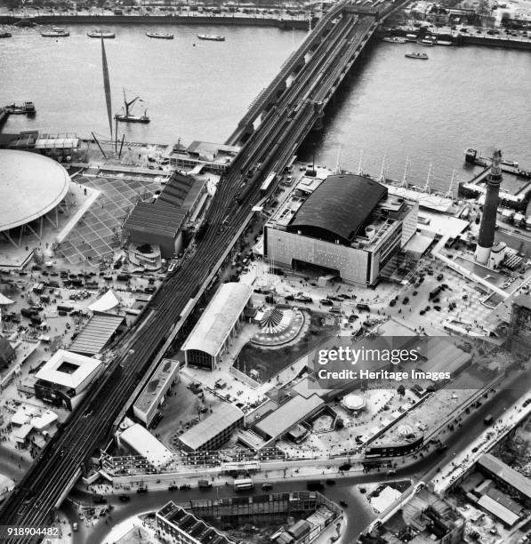 Festival of Britain site, South Bank, Lambeth, London, May 1951. View of the site undergoing final preparations, showing the Hungerford Bridge and...