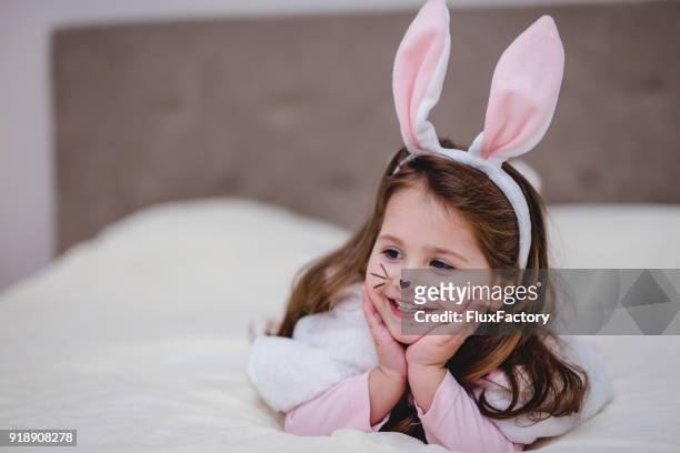 enjoying the holidays - costume rabbit ears stock pictures, royalty-free photos & images