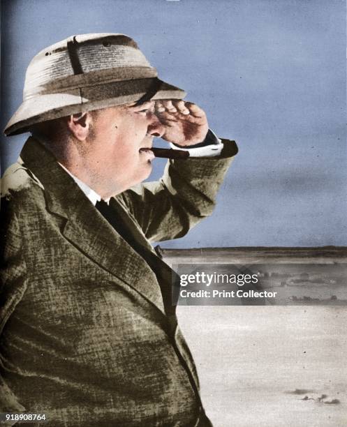 'Mr Churchill Spies the Enemy' Winston Churchill pays a visit to the El-Alamein area, August 19th, 1942. From The War Illustrated Volume 6 edited by...