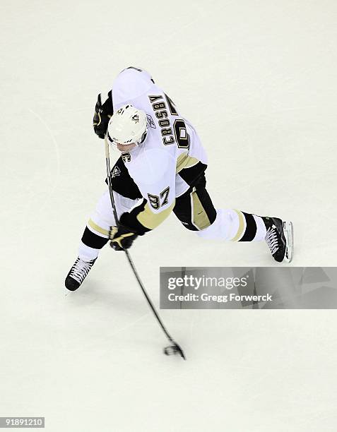 Sidney Crosby of the Pittsburgh Penguins takes a shot during a NHL game against the Carolina Hurricanes on October 14, 2009 at RBC Center in Raleigh,...