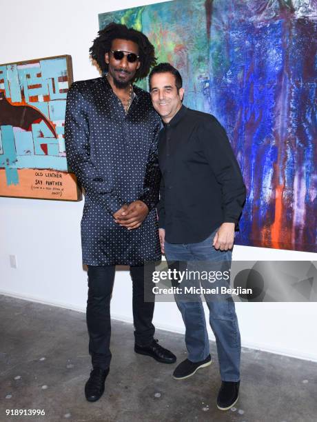 Amare Stoudemire and Happy Walters attend Amare Stoudemire hosts ART OF THE GAME art show presented by Sotheby's and Joseph Gross Gallery on February...