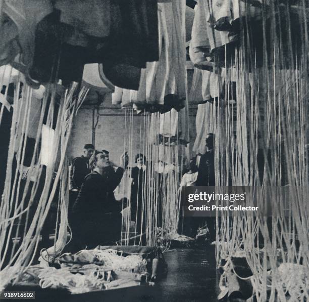 'Loom of life ', 1941. From Air of Glory, by Cecil Beaton. [His Majesty's Stationery Office, London, 1941]Artist Cecil Beaton.