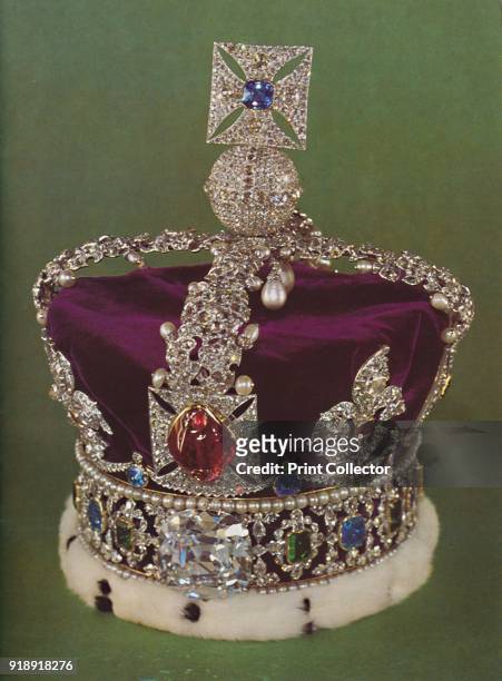 The Imperial State Crown, worn on State occasions. In front is the balas ruby given to the Black Prince in the fourteenth century', 1953. The piece...