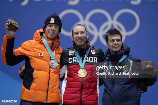 Silver medalist Jorrit Bergsma of the Netherlands, gold medalist Ted-Jan Bloemen of Canada and bronze medalist Nicola Tumolero of Italy celebrate...