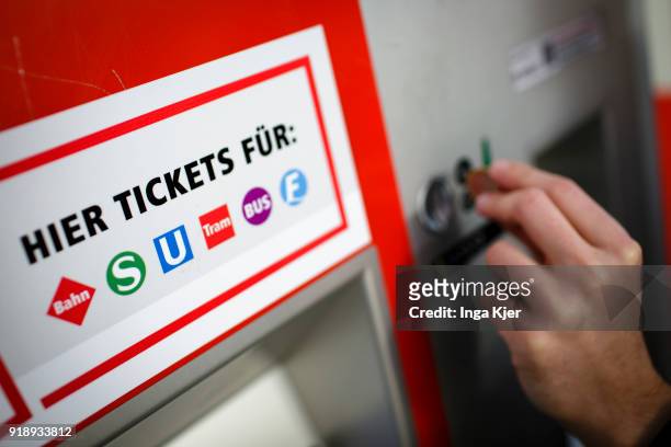 Man buys a ticket at a ticktet machine, on February 14, 2018 in Berlin, Germany.