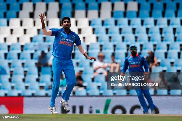 India bowler Jasprit Bumrah reaches to catch his own delivery during the sixth One Day International cricket match between South Africa and India at...