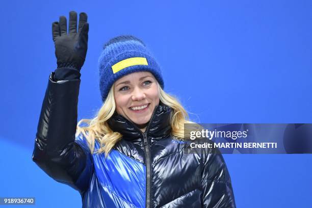 Sweden's gold medallist Frida Hansdotter poses on the podium during the medal ceremony for the alpine skiing women's slalom at the Pyeongchang Medals...