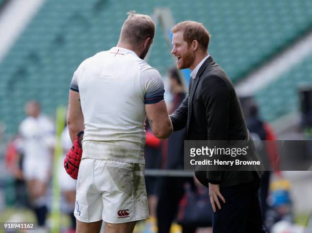 Prince Harry talks with James Haskell of England during an England Training Session at Twickenham Stadium on February 16, 2018 in London, England.
