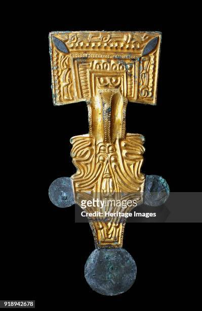 Square-headed brooch, Anglo-Saxon Period, . Long gilt bronze square headed brooch. Dimensions: length: 14.1 cmwidth: 6.1 cm