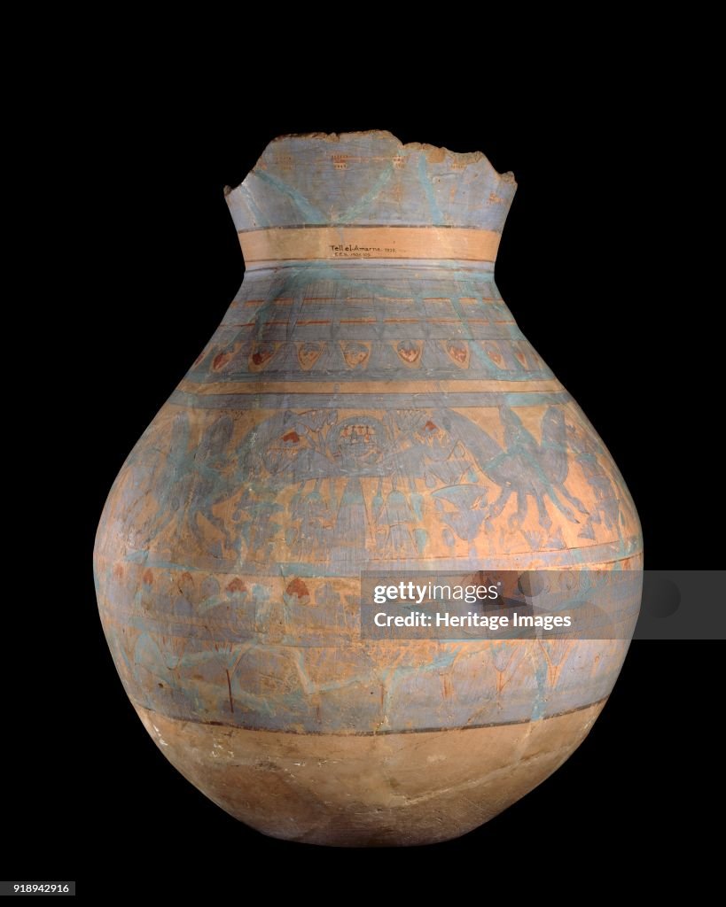 Hand- And Wheel-Made Jar With Blue Painted Motifs
