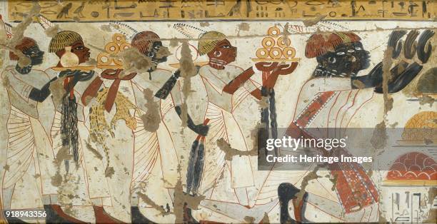 Copy of wall painting from private tomb 40 of Huy, Thebes , Nubians with tribute, 20th century. Framed.