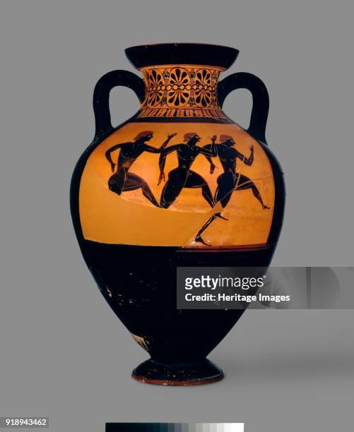 Attic black-figure Panathenaic amphora with depiction of Athena and Hermes between columns crowned with cockerels and three runners, c 540-530 BC....