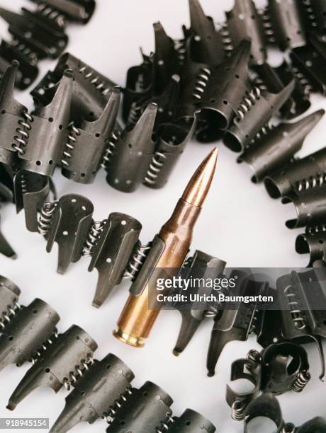 Symbolic photo on the theme of operational readiness of the Bundeswehr, NATO, etc. The photo shows a cartridge belt with only one rifle cartridge.