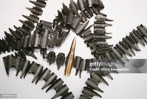 Symbolic photo on the theme of operational readiness of the Bundeswehr, NATO, etc. The photo shows a cartridge belt with only one rifle cartridge.