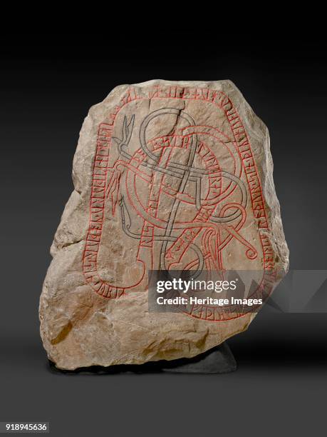 Rune stone, Viking Age, . Rune stone with red inscription. Dimensions: height: C. 138 cm maximumwidth: 113.5 cm maximumwidth: 81 cm minimumthickness:...