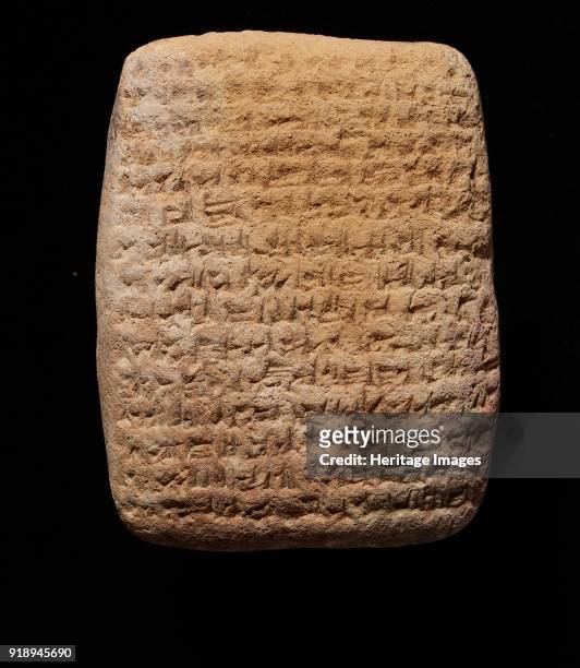 Clay tablet with cuneiform script on both sides, Late Babylonian, c6th century BC. Provisional identification: Late Babylonian land-sale contract....