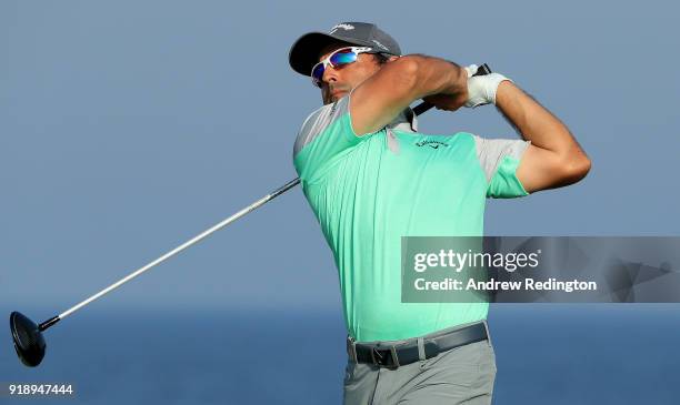 Fabrizio Zanotti of Paraguay tees off on the par for 18th hole during the second round of the NBO Oman Open at Al Mouj Golf on February 16, 2018 in...