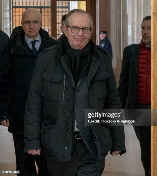 Minister of Economy and Finances of Italy Pier Carlo Padoan smiles while arriving to meet with Portuguese Finance Minister Mario Centeno in the...