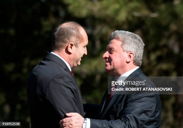 Macedonian President Gjorge Ivanov greets his Bulgarian counterpart Rumen Radev upon his arrival on February 16, 2018 in Skopje for a two-day...