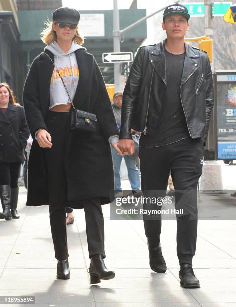 Model Hailey Clauson and Jullien Herrera are seen walking in soho on February 15, 2018 in New York City.