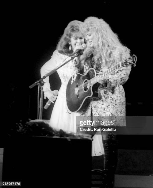 Naomi Judd and Wynonna Judd perform at The Judds "The Final Tour" Concert on June 23, 1991 at the Pacific Ampitheater in Costa Mesa, California.