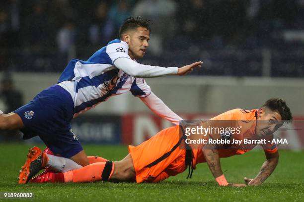 Diego Reyes of FC Porto and Roberto Firmino of Liverpool during the UEFA Champions League Round of 16 First Leg match between FC Porto and Liverpool...
