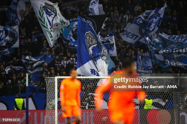 Fans of FC Porto wave flags and banners during the UEFA Champions League Round of 16 First Leg match between FC Porto and Liverpool at Estadio do...