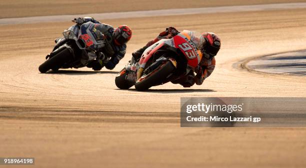 Marc Marquez of Spain and Repsol Honda Team leads Esteve Rabat of Spain and Reale Avintia Racing during the MotoGP Tests In Thailand on February 16,...