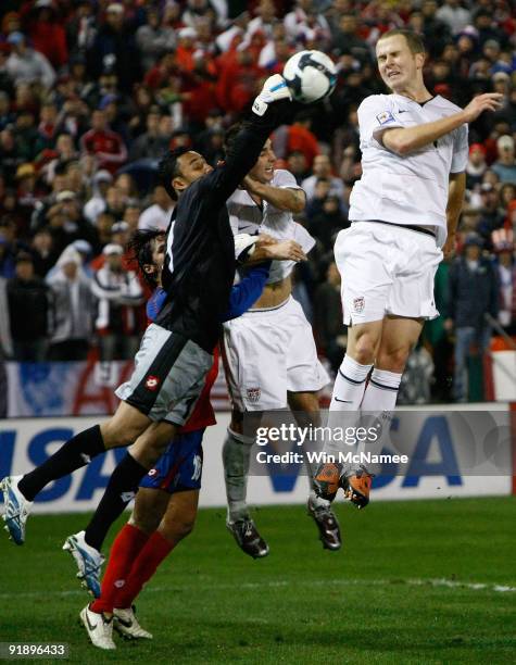 Costa Rica goalie Keilor Navas battles Oguchi Onyewu of the U.S. During their match in the FIFA 2010 World Cup Qualifier at RFK stadium on October...