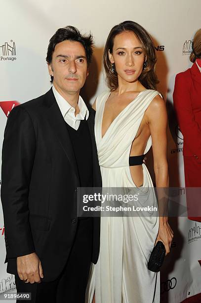 Director Yvan Attal and actress Maggie Q attend the premiere of "New York, I Love You" at the Ziegfeld Theatre on October 14, 2009 in New York City.