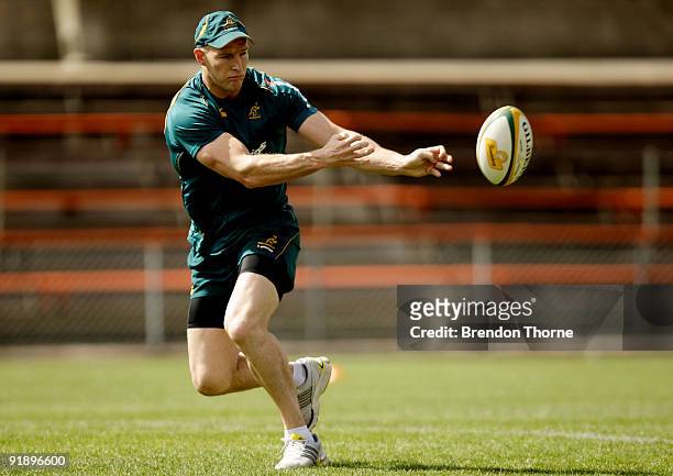 Stirling Mortlock of the Wallabies passes during an Australian Wallabies training session at Leichhardt Oval on October 15, 2009 in Sydney, Australia.