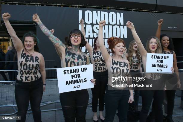 Animal rights group PETA protest outside the entrance to London fashion week on February 16, 2018 in London, England.