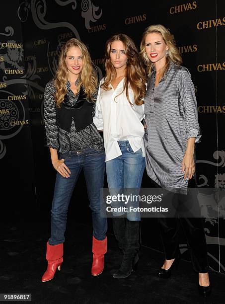 Models Martina Klein, Clara Alonso and Judit Masco attend the "Smoking Chivas Code" fashion show, at the Chivas Studio on October 14, 2009 in Madrid,...